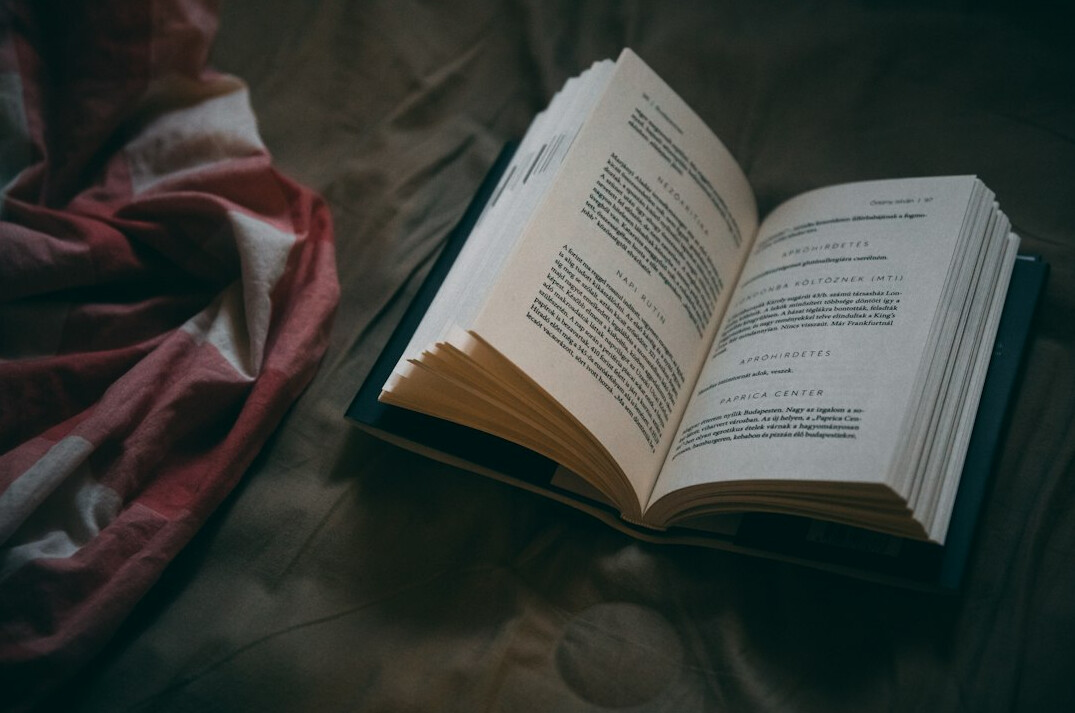 open book with thriller pages
